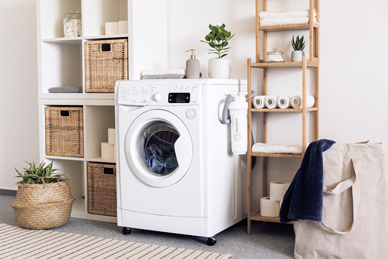 Front-load washing machine being repaired by a licensed technician in Northern Virginia